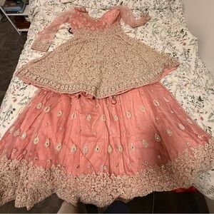 Elegant Pink and Gold Embroidered Lengha with heavy embroidered top and duppatta